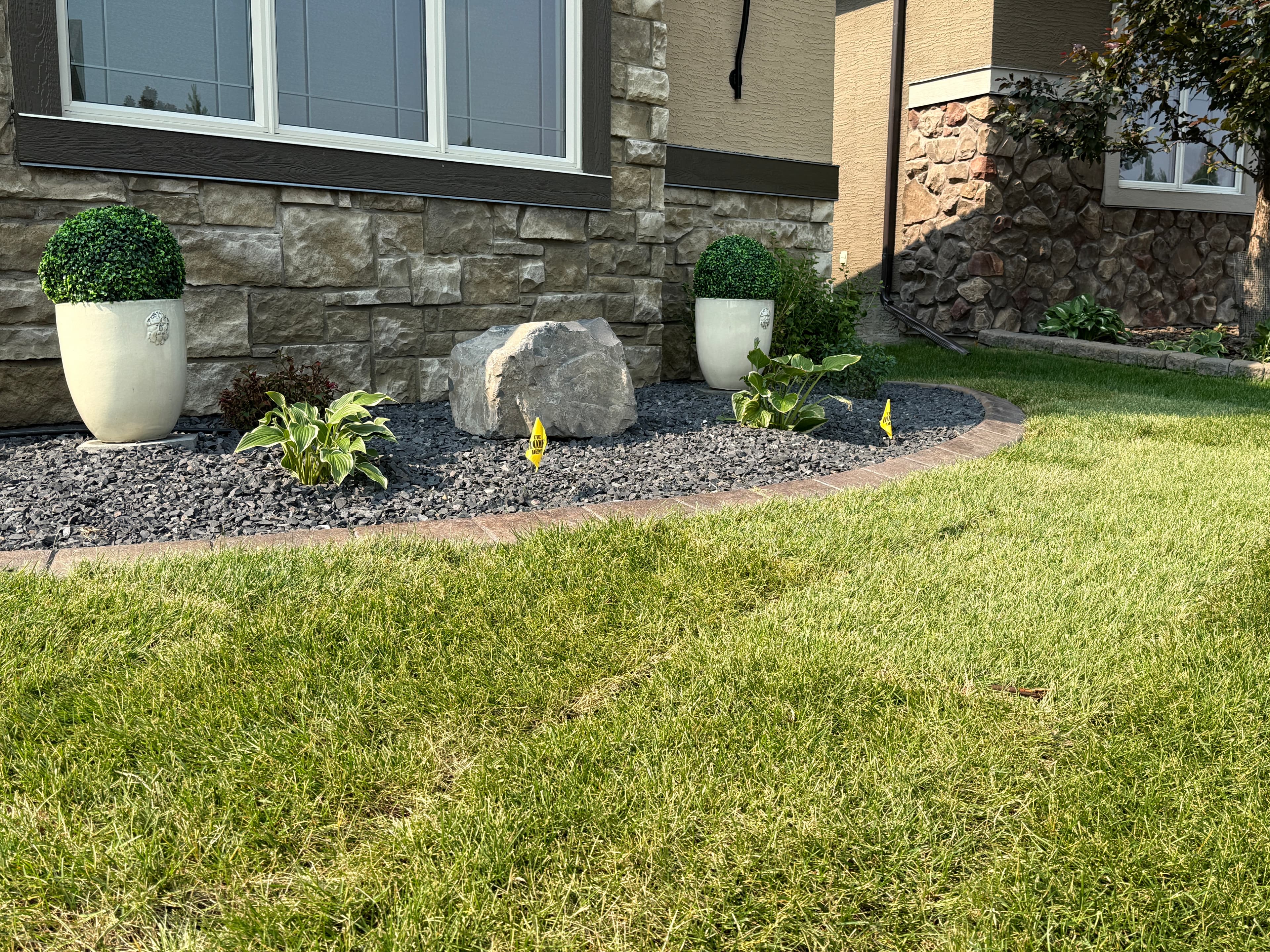 Close up of the new 20 mil Rundle rock bed and 300 lb boulder